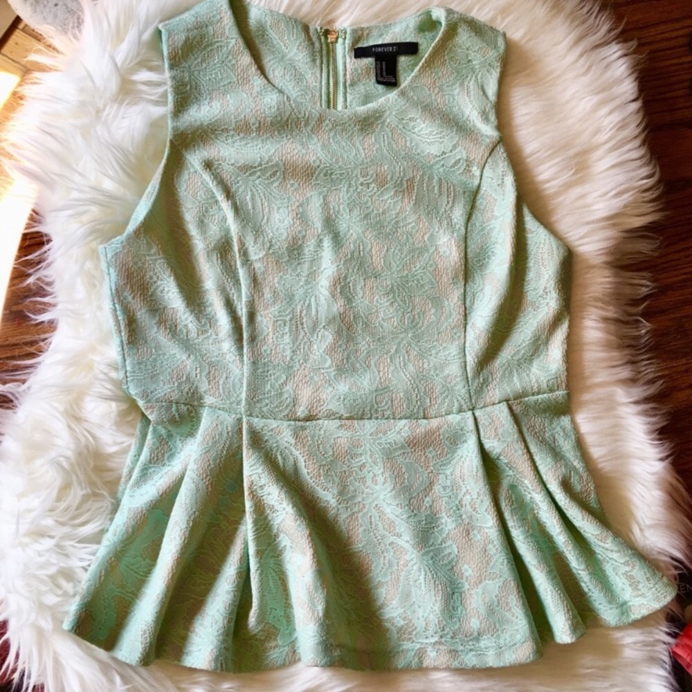 Mint peplum top with white lace detail